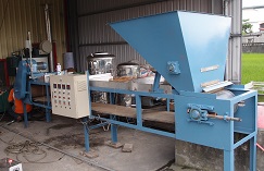 The continuous steam sterilization machine for the nursery soil of rice created to improve the quality of organic rice seedlings.